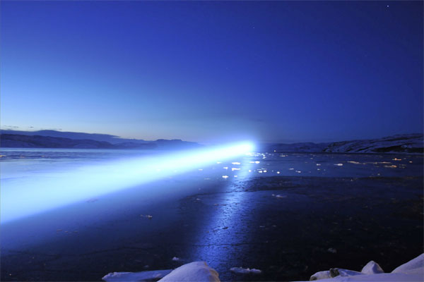 Stefano Cagol, The End of the Border (of the mind), 2013, azione. faro, 7000 W, generatore, furgone, adesivi / action, beacon, 7000 W, power genrator, van, labels. Kirkenes. Photo: Stefano Cagol